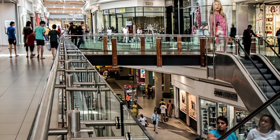 Shoppers walk through a mall